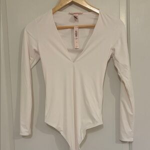 NWT- Victoria's Secret Cream Long Sleeve Bodysuit, S; MSRP: $60